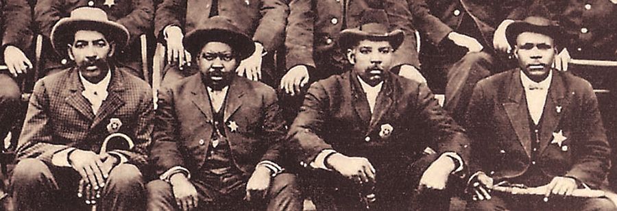 Muskogee Police Department including Bass Reeves with a cane (1908)